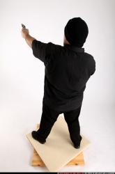 SLAVOJ_SLAVOJ MOBSTER-DUAL-GUNS-POSE2