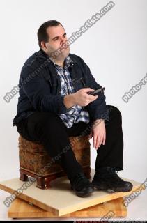 2012 03 SLAVOJ SITTING TV REMOTE CONTROL 01