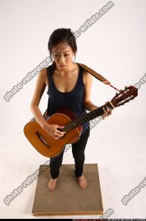 naomi-playing-guitar