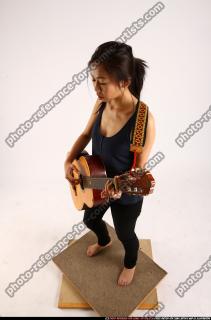 2012 03 NAOMI PLAYING GUITAR 01 A
