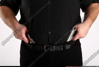 2012 03 SLAVOJ DRAWING WEAPON FROM HOLSTER DETAIL 00