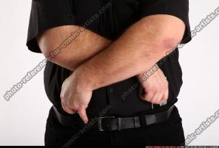 2012 03 SLAVOJ DRAWING WEAPON FROM HOLSTER DETAIL 01