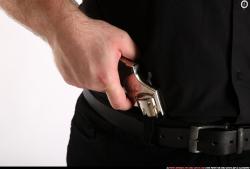 SLAVOJ DRAWING WEAPON FROM HOLSTER DETAIL