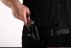 SLAVOJ DRAWING WEAPON FROM HOLSTER DETAIL