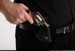 SLAVOJ DRAWING WEAPON FROM HOLSTER DETAIL