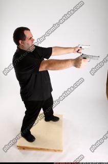 2012 06 SLAVOJ DUAL GUNS POSE4 02 A