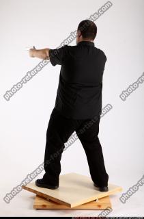 2012 06 SLAVOJ DUAL GUNS POSE4 05 B