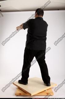 2012 06 SLAVOJ DUAL GUNS POSE4 05 C