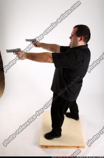 2012 06 SLAVOJ DUAL GUNS POSE4 06 A
