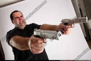 2012 06 SLAVOJ DUAL GUNS POSE4 11