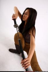 naomi-unsheathing-katana