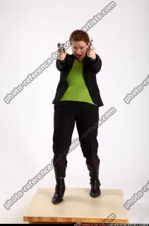 2012 07 NADIYA DUAL PISTOLS POSE2 00 B