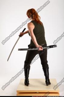 2012 08 NADIYA UNSHEATHING SWORD SWING 04