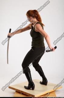 2012 08 NADIYA UNSHEATHING SWORD SWING 05