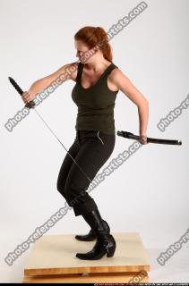 2012 08 NADIYA UNSHEATHING SWORD SWING 06