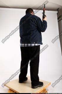 2012 08 SLAVOJ GUARDING POSE AK SUNGLASSES 05 C