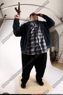 2012 08 SLAVOJ GUARDING POSE AK SUNGLASSES 10