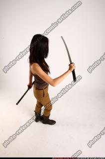 2012 08 NAOMI UNSHEATHING SWORD SWING 06 A