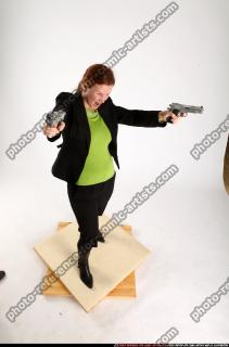 2010 08 NADIYA DUAL PISTOLS POSE3 01 A