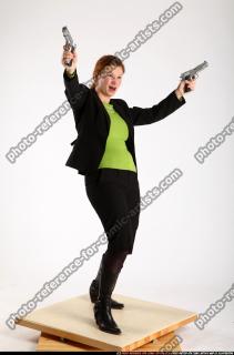 2010 08 NADIYA DUAL PISTOLS POSE3 01 B
