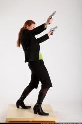 Woman Adult Average White Fighting with gun Standing poses Business