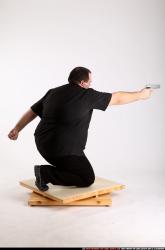 Man Adult Chubby White Fighting with gun Kneeling poses Casual