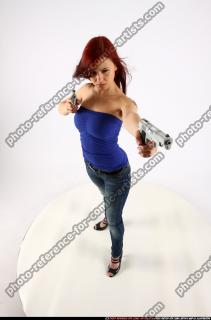 2013 05 NINA DUAL GUNS POSE1 00 A