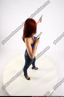 2013 05 NINA DUAL GUNS POSE1 03 A