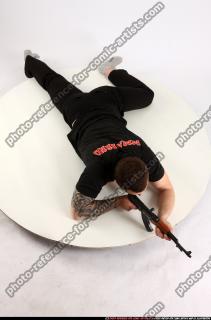 2013 06 ALEX LAYING AIMING AK-47 01 A