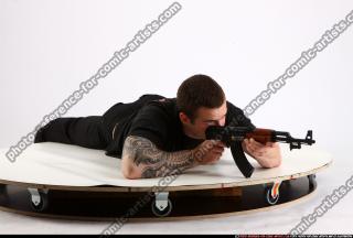 2013 06 ALEX LAYING AIMING AK-47 01 B