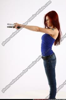 2013 06 NINA DUAL GUNS POSE2 06