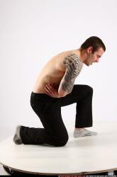 Man Adult Athletic White Neutral Kneeling poses Pants