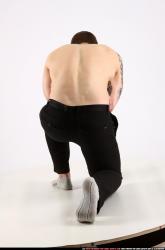 Man Adult Athletic White Neutral Kneeling poses Pants