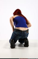 nina-kneeling-wounded