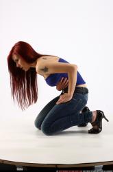 nina-kneeling-wounded