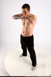 alex-standing-guarding-pose-knife