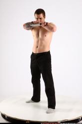 alex-standing-guarding-pose-knife