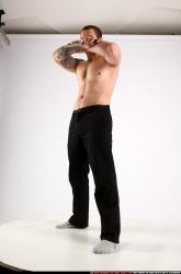 alex-standing-guarding-pose-knife