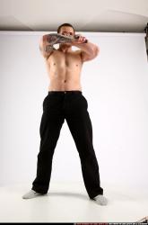 alex-standing-guarding-pose-knife