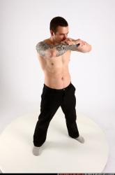 alex-standing-guarding-pose-knife