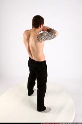 alex-standing-guarding-pose-knife