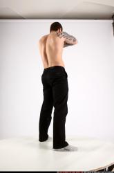 alex-standing-guarding-pose-knife