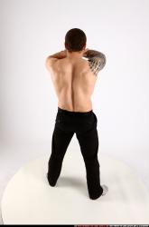 alex-standing-guarding-pose-knife