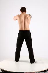 alex-standing-guarding-pose-knife