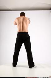 alex-standing-guarding-pose-knife