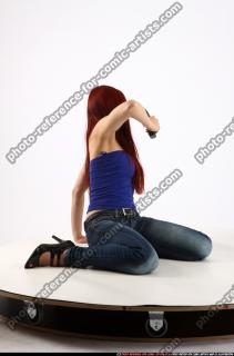 2013 09 NINA SITTING PISTOL POSE2 05
