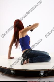 2013 09 NINA SITTING PISTOL POSE2 06