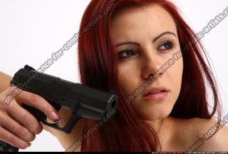 2013 09 NINA SITTING PISTOL POSE2 16