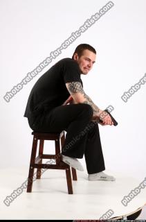2013 09 ALEX SITTING PISTOL POSE1 02 B