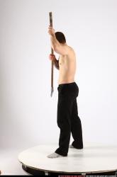Man Adult Athletic White Fighting with spear Standing poses Pants